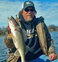 image of Steve Kusske with Rainy River Walleye