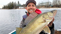 image of justin bailey with big walleye