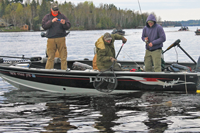 image of men landing fish