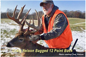 image of Craig Nelson with 12 point buck