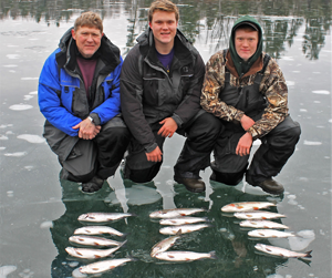 image of Steere family with bag of rainbow trout
