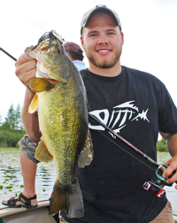 image of Brett McComas with Large Bass