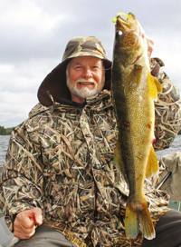 image of Greg Clusiau with Rainy Lake Walleye