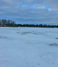 image of ice fisherman on ice near Grand Rapids MN