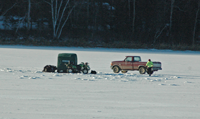 image of pickup truck parked on the ice