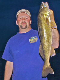 image of Briand Castellano holding big Walleye