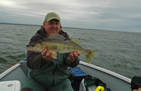 image of Kevin Scott with Leech Lake Walleye
