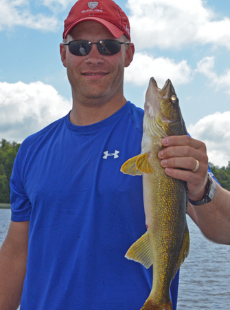 image of Duane Rothstein with big walleye