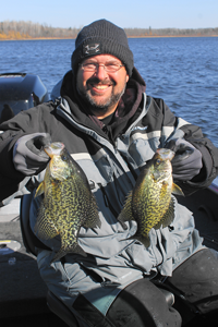 image of Travis Sorokie with big Crappies