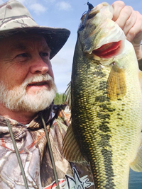 image of Greg Clusiau with big Largemouth Bass