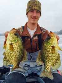 image of Ryan Berzins with huge Crappies