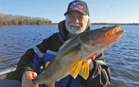 image of Greg Clusiau with giant Walleye