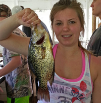 image of woman holding nice Crappie