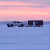 image of ice fishing shelter on ice