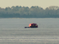 image of ice fishing shelter on the ice