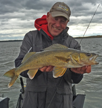 image of walleye guide with big walleye