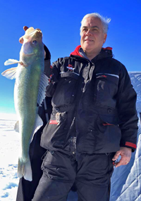 image of mike walsh with lake winnipeg walleye