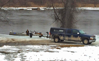 image of small boat at rainy river access