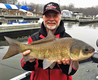 image of greg clusiau with buffalo fish