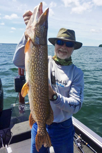 image of Greg Clusiau with big northern pike