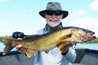 image of greg clusiau with big walleye