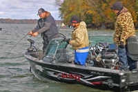 image of Amos Wolf landing big walleye