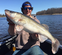 image of Colt Anderson holding giant Walleye