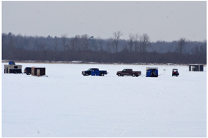 image of pickup trucks on the ice