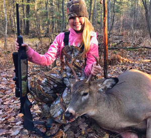 image of claire clusiau with buck deer
