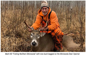 image of mark hill with buck deer