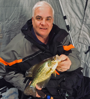 image of mike walsh with nice crappie