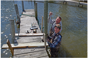 image of chad mertz working on docks