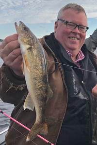 image of gary sundin with walleye