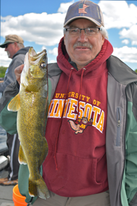 image of Tim Fischbach with big walleye