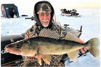 image of greg clusiau with big walleye