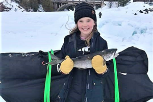 image of Claire Clusiau with lake trout from superior