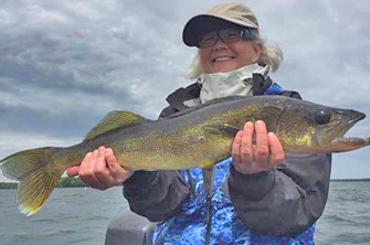 image of karen peterson with big walleye