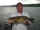 Mitch proves that staying out in the rain is okay when you find Smallmouth Bass like this