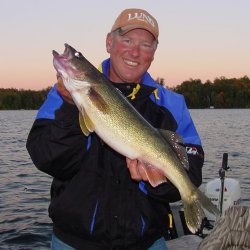 Pro Guide Jeff Sundin with another nice Walleye caught on a creek chebb.