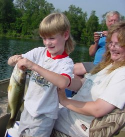 Eddy admires one of the first Largemouth Bass of his fishing career