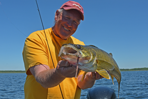 image of Brian and Will Rusch netting Walleye