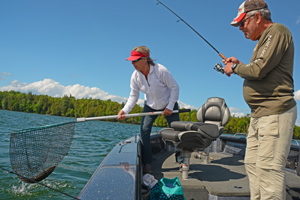 image of couple landing walleye