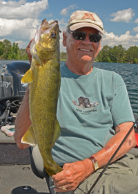 image of bob carlson with big walleye