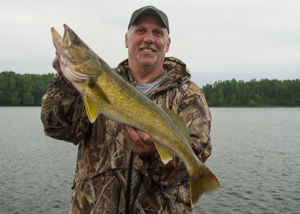 image of phil goettl with big walleye