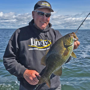 image of jeff sundin with smallmouth bass