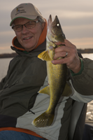 image of Gray Dahlberg on Cutfoot sioux with nice Walleye