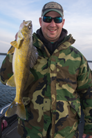 image of Grady Dahlberg with cutfoot sioux walleye