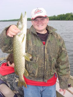 image of kid with big walleye