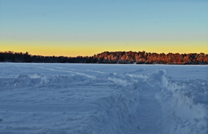 image of snow cover on lake