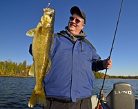 Chad Haatvedt KAXE Radio holding Walleye